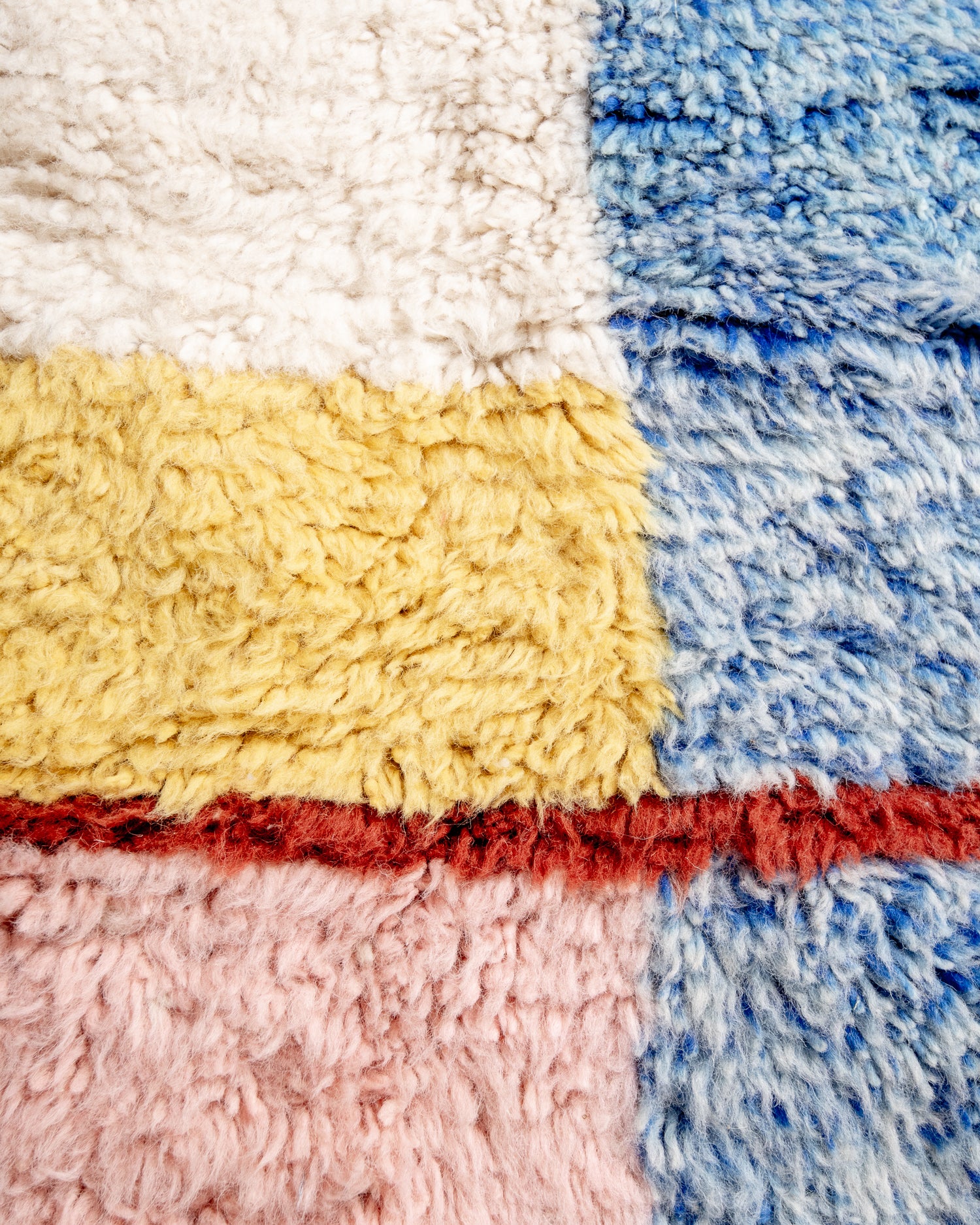 Modern, designer, handcrafted Berber rug from Morocco. Beniourain carpet with beautiful colours and patterns and fluffy wool texture.